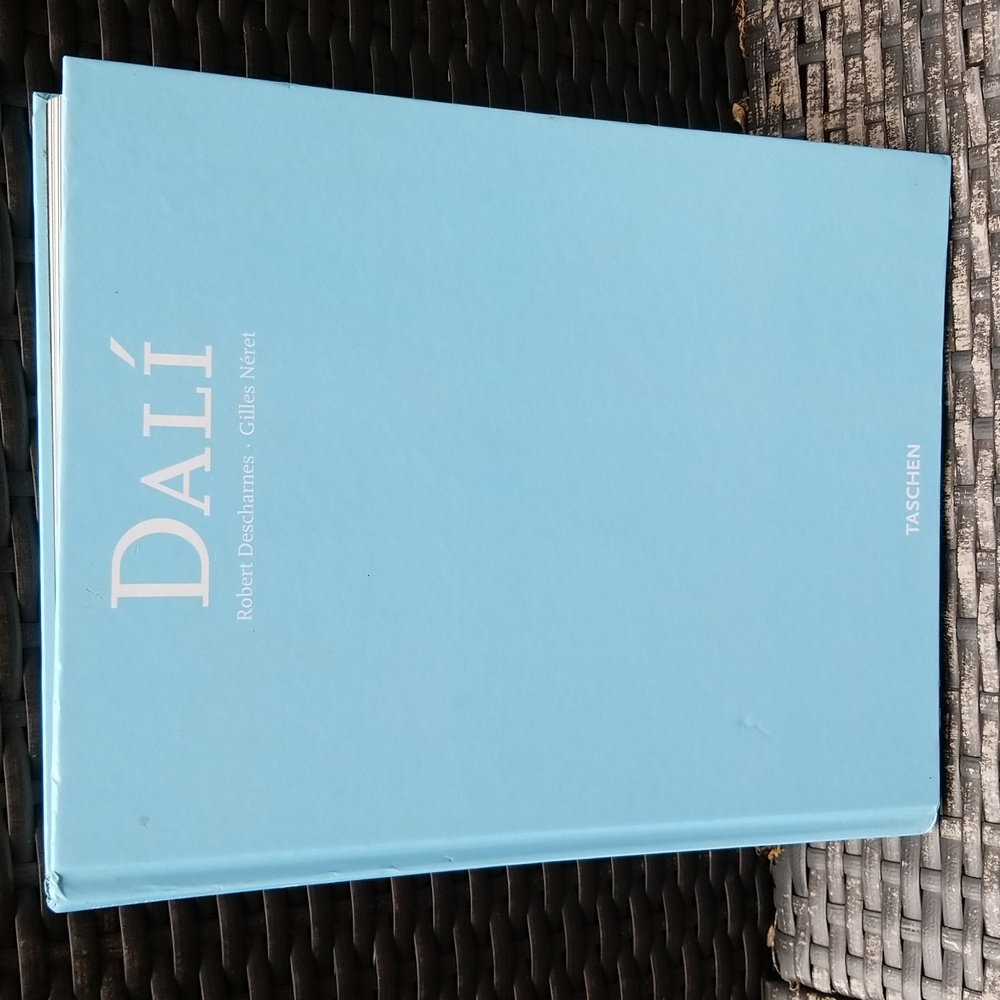 Dali by Robert Descharmes and Gilles Neret. Wonderful book exploring his art!